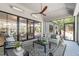This outdoor patio is perfect for entertaining, with a ceiling fan and comfortable seating at 2104 Manuel St, Raleigh, NC 27612