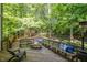 Spacious backyard deck with built-in benches, perfect for outdoor dining and entertaining at 215 Hopesworth Ct, Hillsborough, NC 27278