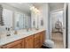 Bathroom with a double vanity, cabinets, and a walk-in shower at 215 Hopesworth Ct, Hillsborough, NC 27278