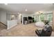 Spacious game room with a seating area, a TV, a foosball table, and natural light at 215 Hopesworth Ct, Hillsborough, NC 27278