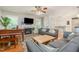Cozy living room with a fireplace, piano, and comfortable seating arrangement at 215 Hopesworth Ct, Hillsborough, NC 27278