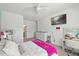 Bedroom featuring a bed, a ceiling fan, and TV for leisure and relaxation at 221 Obsidian Dr, Holly Springs, NC 27540