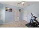 Bedroom featuring a ceiling fan, neutral paint, and TV for leisure and relaxation at 221 Obsidian Dr, Holly Springs, NC 27540