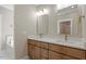 Bathroom featuring double sink vanity with modern fixtures at 2405 Pearces Rd, Zebulon, NC 27597