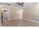 Bedroom boasting luxury vinyl plank flooring and tray ceilings at 2405 Pearces Rd, Zebulon, NC 27597