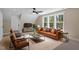Comfortable living room featuring recessed lighting, a ceiling fan, and plush seating at 2405 Pearces Rd, Zebulon, NC 27597