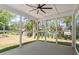 Screened in porch offering views of the backyard at 2405 Pearces Rd, Zebulon, NC 27597
