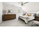 A bright bedroom with a ceiling fan, with neutral colors, and coordinating furniture at 2481 Foxwood Dr, Chapel Hill, NC 27514