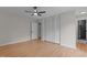 Bedroom showcasing hardwood floors, ceiling fan, and a closet with plenty of storage space at 2505 Catalina Ct, Raleigh, NC 27607