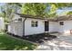 Beautiful home featuring a newly landscaped yard, stylish black trim and front door at 2505 Catalina Ct, Raleigh, NC 27607