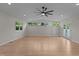 Spacious living area featuring recessed lighting, ceiling fan, hardwood flooring and access to the yard at 2505 Catalina Ct, Raleigh, NC 27607