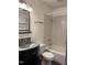 Functional bathroom featuring a vanity sink, toilet, and shower-tub combo, perfect for everyday convenience at 2600 Newbold St, Raleigh, NC 27603