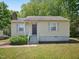 Charming single-story home with a quaint front yard and inviting entrance, perfect for first-time buyers at 2600 Newbold St, Raleigh, NC 27603