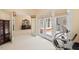Open bonus room with multiple entryways and natural light at 27 Woodgate Ct, Durham, NC 27713