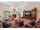 Well-appointed living room with a fireplace, hardwood floors, and stylish furnishings, perfect for relaxation at 27 Woodgate Ct, Durham, NC 27713