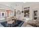 Relaxing screened porch with a ceiling fan and comfortable seating, ideal for enjoying the outdoors at 27 Woodgate Ct, Durham, NC 27713