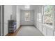 Bright bonus room with hardwood floors, white trim, and plenty of natural light at 2704 Fairview Rd, Raleigh, NC 27608