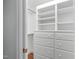 Nicely appointed walk-in closet featuring a combination of rods, drawers, and shelves for all your storage needs at 2704 Fairview Rd, Raleigh, NC 27608