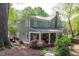 Charming home with a covered porch, manicured lawn, and stone pathway at 2704 Fairview Rd, Raleigh, NC 27608