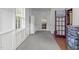 Hallway with fresh carpet and white trim, leading to rooms with plenty of natural light at 2704 Fairview Rd, Raleigh, NC 27608