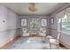 A beautifully furnished sitting area with dual seating, natural light and ornate decor at 2704 Fairview Rd, Raleigh, NC 27608