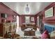 Living room with a fireplace, hardwood floors, and stylish furniture at 2704 Fairview Rd, Raleigh, NC 27608