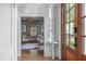 Inviting interior view showcasing a hardwood entry into a well-lit and styled living space at 2704 Fairview Rd, Raleigh, NC 27608
