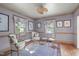 Comfortable living room with natural light, stylish furnishings, and beautiful hardwood floors at 2704 Fairview Rd, Raleigh, NC 27608