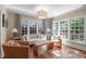 Inviting living room with natural light, comfortable seating, and beautiful hardwood floors at 2704 Fairview Rd, Raleigh, NC 27608