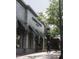 Attractive storefront for Kannon's Clothing with black and white awnings and stylish exterior at 2704 Fairview Rd, Raleigh, NC 27608