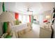 Bright bedroom with a ceiling fan, large windows, and a decorative ceiling at 2711 Laurelcherry St, Raleigh, NC 27612