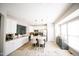 Bright kitchen featuring a large island, stainless steel appliances, and ample cabinet space at 2711 Laurelcherry St, Raleigh, NC 27612