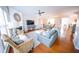 Spacious living room with a fireplace, comfortable seating, and an open layout at 2711 Laurelcherry St, Raleigh, NC 27612