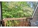 View of lush trees from a private balcony at 294 Summerwalk Cir, Chapel Hill, NC 27517