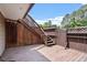Exterior wood deck and stairs leading to a fenced patio area at 294 Summerwalk Cir, Chapel Hill, NC 27517