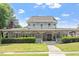 Stunning two-story home featuring a charming porch with decorative trim and a well-manicured lawn at 294 Summerwalk Cir, Chapel Hill, NC 27517