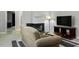 Comfortable living room with a fireplace and a flat-screen TV at 294 Summerwalk Cir, Chapel Hill, NC 27517