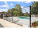 Fenced in community pool area with plenty of room for lounge chairs at 294 Summerwalk Cir, Chapel Hill, NC 27517