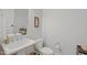 Half bathroom featuring pedestal sink, toilet, and a neutral color scheme at 3029 Mountain Hill Dr, Wake Forest, NC 27587
