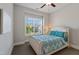 Bedroom featuring a large window, carpet, and modern decor at 3029 Mountain Hill Dr, Wake Forest, NC 27587