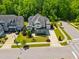 Beautiful home featuring stone accents, a manicured lawn, and an inviting front entrance at 3029 Mountain Hill Dr, Wake Forest, NC 27587