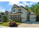 Charming home with stone accents, well-maintained landscaping, and a welcoming two-car garage at 3029 Mountain Hill Dr, Wake Forest, NC 27587