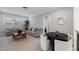 Relaxing living room featuring two sofas, a dark table, and a wooden coffee table with decor at 3029 Mountain Hill Dr, Wake Forest, NC 27587