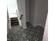 Unique staircase showcasing decorative tiling leading to the upper level at 305 E Harnett St, Benson, NC 27504