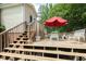 The back deck is great for relaxing and entertaining with outdoor dining at 306 N Sixth St, Mebane, NC 27302