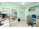 Functional bedroom space with ample shelving and a dedicated desk area at 306 N Sixth St, Mebane, NC 27302