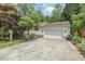 Charming single-Gathering home with an attached two-car garage and ample driveway parking at 306 N Sixth St, Mebane, NC 27302