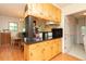 Cozy kitchen with a dining area, wooden cabinets and an open layout at 306 N Sixth St, Mebane, NC 27302