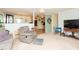 Open living room with a recliner, tv, and an open layout to the kitchen at 306 N Sixth St, Mebane, NC 27302