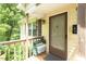 Cozy covered porch with a bench, perfect for relaxing outdoors at 306 N Sixth St, Mebane, NC 27302